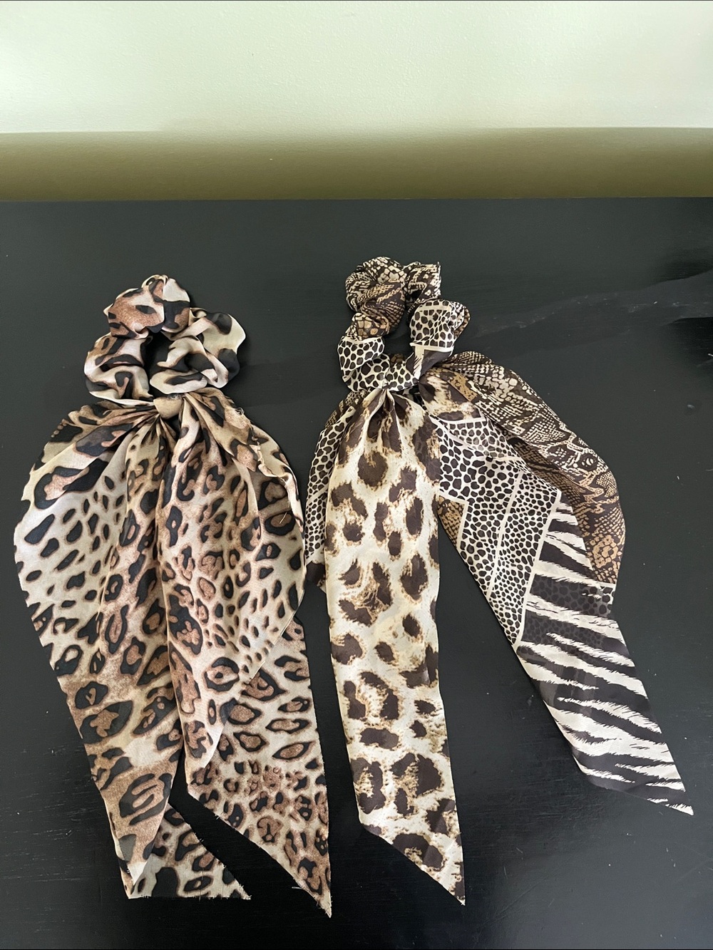 2 leopard print hair scrunchies with long tails